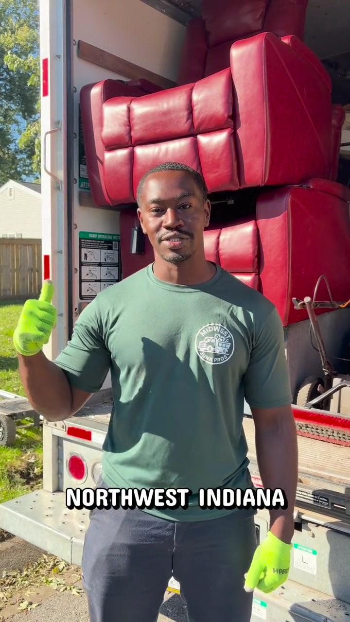 Midwest Junk Pros owner beside a loaded removal truck — Furniture removal